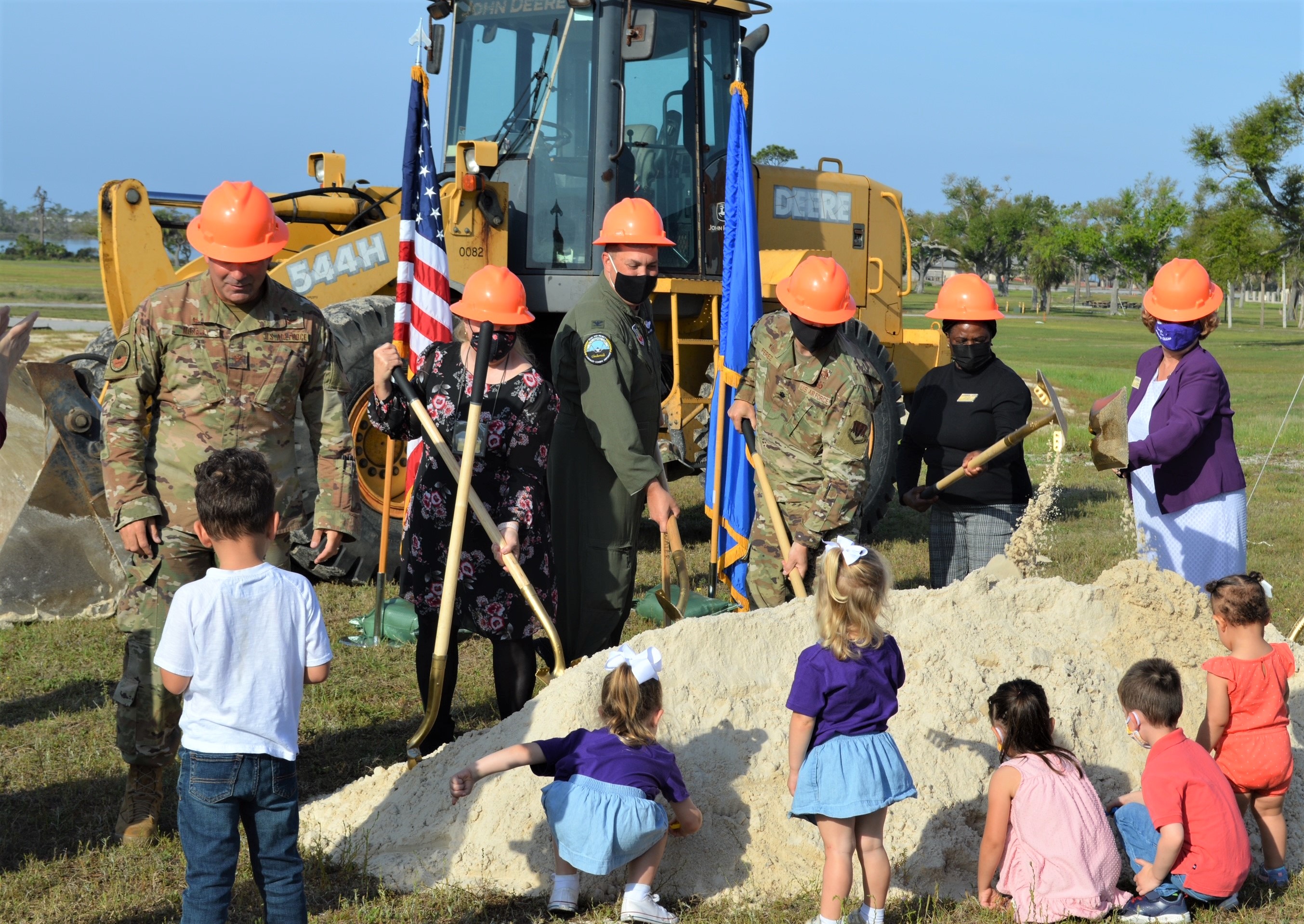 Airmen, Civilians, and children participate in first dig at new CDC